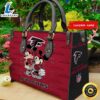 Atlanta Falcons Mickey And Minnie Women Leather Hand Bag Tshirt