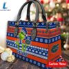 NCAA Florida Gators Grinch Christmas Women Leather Hand Bag 3 NCAA Florida Gators Grinch Christmas Women Leather Hand Bag Tee