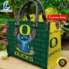 NCAA Oregon Ducks Stitch Women Leather Hand Bag Tshirt