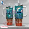 NFL Miami Dolphins Stitch Glitter Custom Stanley Quencher 40oz Stainless Steel Tumbler With Handle - Stitch Tumbler 40OZ 3 NFL Miami Dolphins Stitch Glitter Custom Stanley Quencher 40oz Stainless Steel Tumbler With Handle